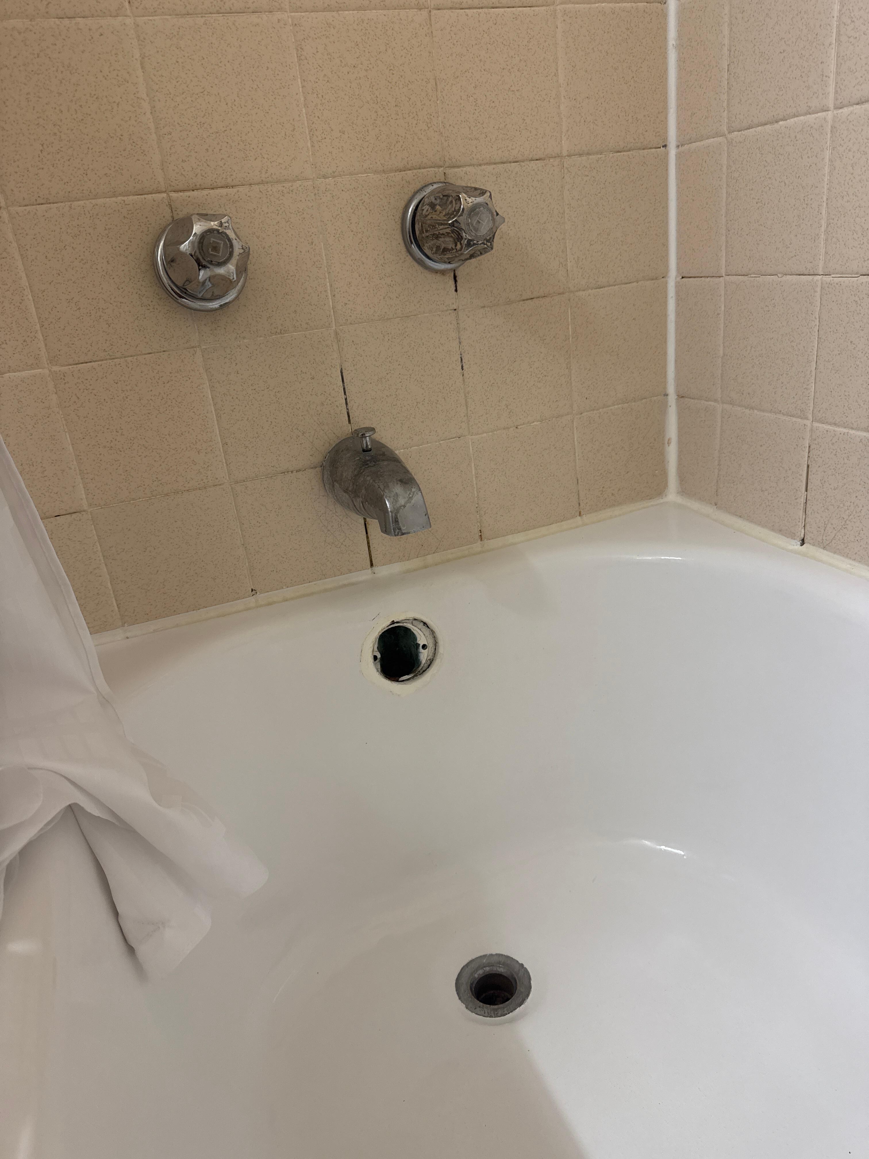 Hole in bath tub 