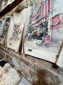 お店をモチーフにした壁に飾られた絵です。