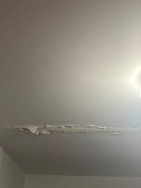 Bubbled ceiling in bathroom