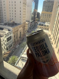 They have a full bar downstairs. Our room came with a complimentary drink- this was my choice. Look at the view!