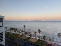 View of sunrise from 7th floor breakfast area