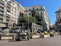 the busy roundabout near the shops by hotel