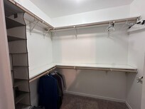 Nice big master closet with plenty of space for suitcases, etc.