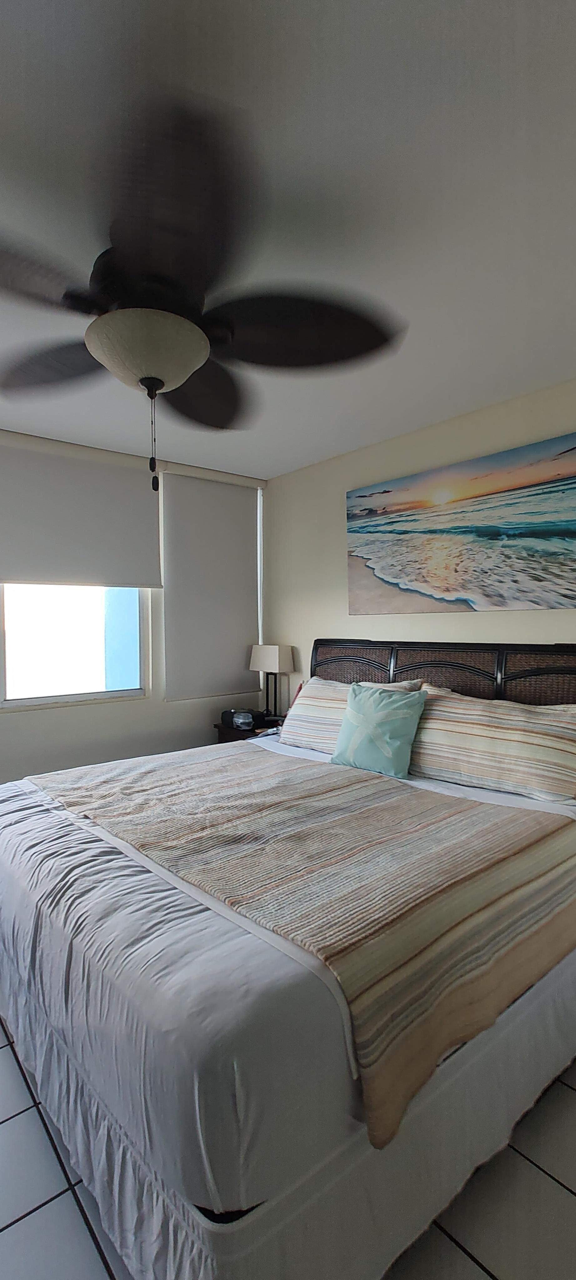 Bedroom with a comfortable king bed.