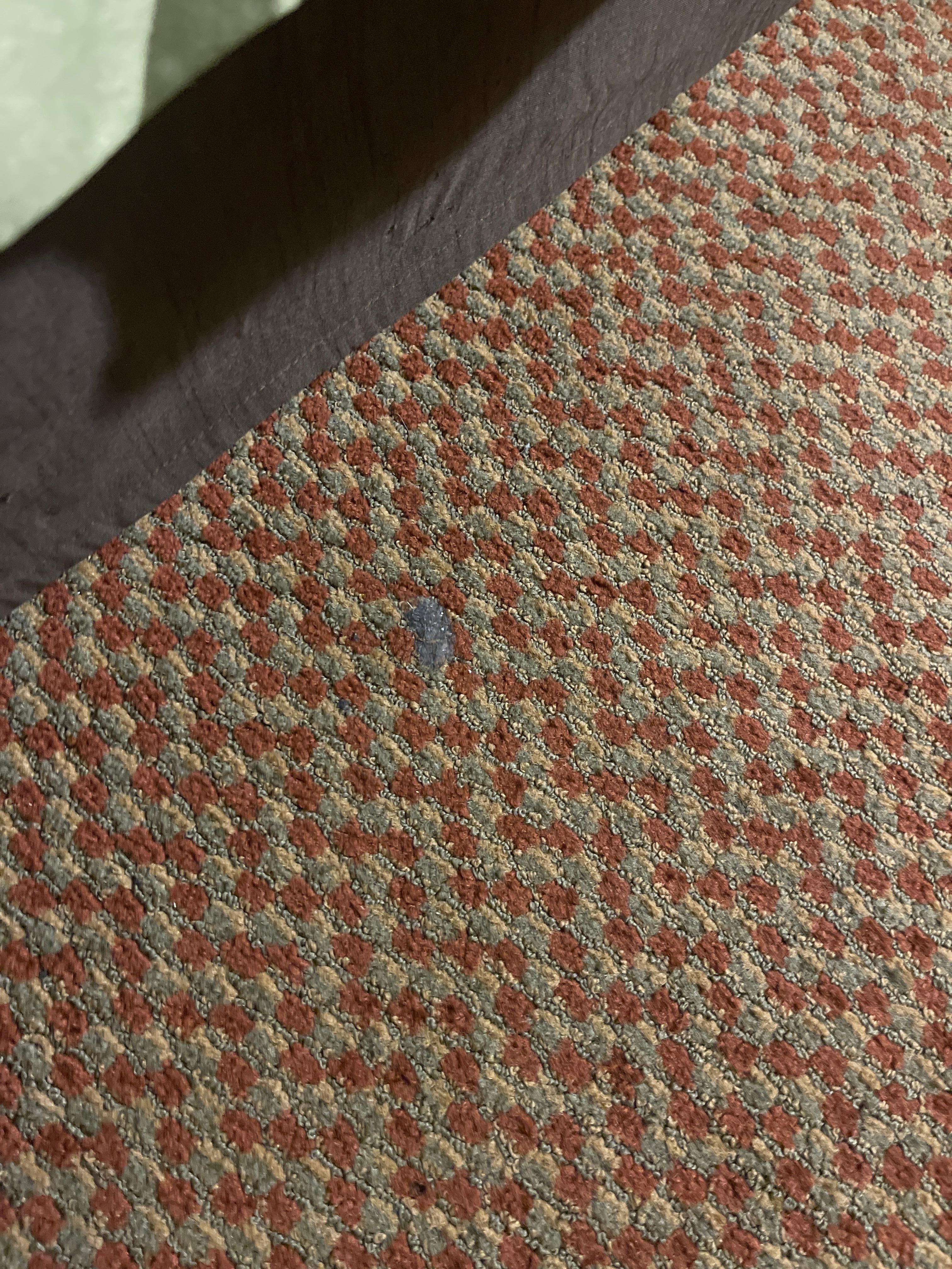 Multiple stained carpets all over and beside the beds from who knows what!!!