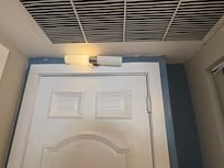 Light hanging at weird angle, not fully functioning and poor construction craftsmanship.