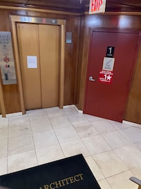 One of the elevators and stairs to floor