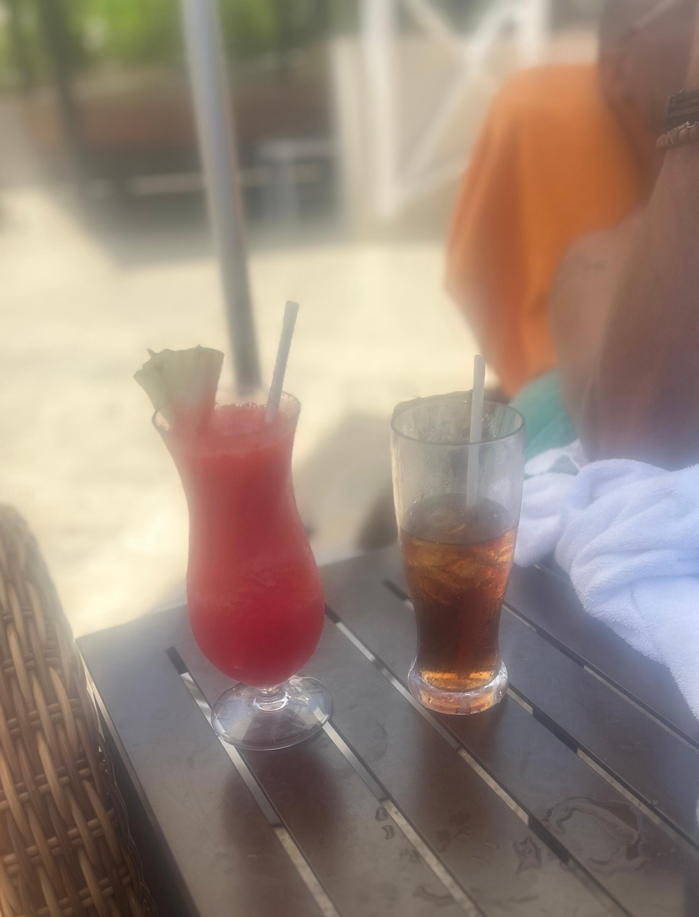 Relaxing by the pool with refreshing drinks!