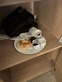 Items left in the cabinet next to the closet.