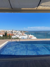 Small pool overlooking the beach .
