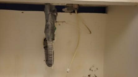 Leaky kitchen pipes made the tile floor unsafe.
