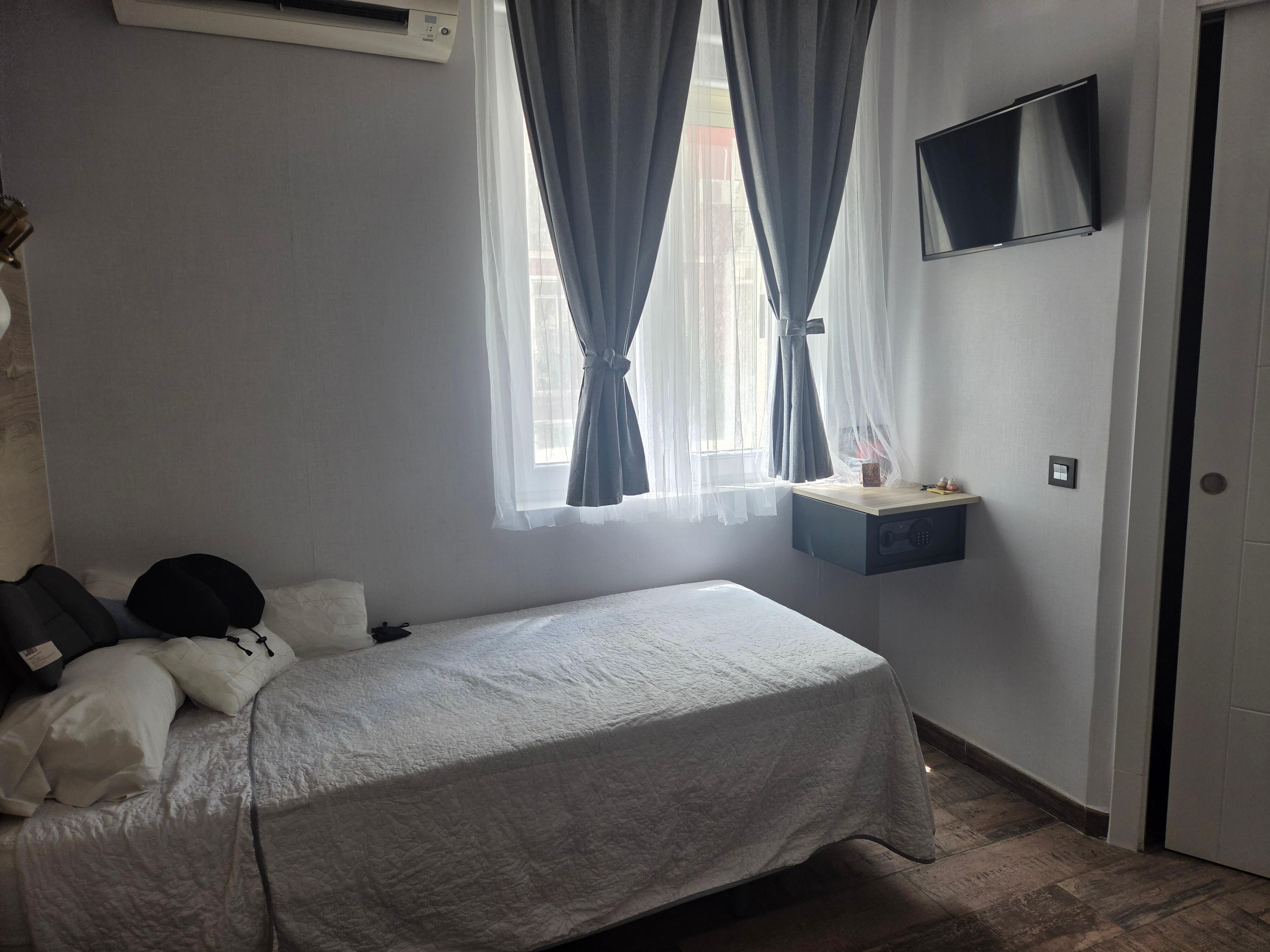 Cute little room also has a TV. 