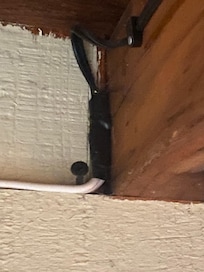 Extension cord spliced into light fixture wiring in most rooms.