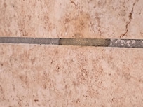 Hard body wax stuck to floor
