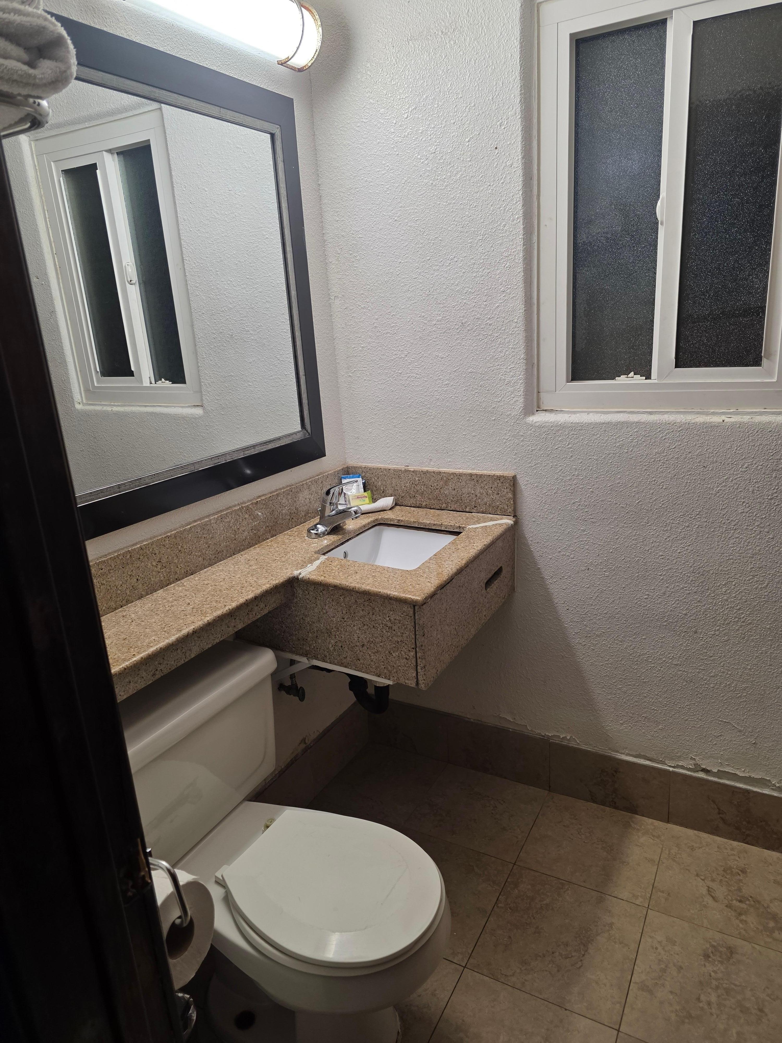 The sink has been obviously repaired but not very stable