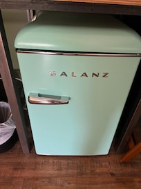 Cute vintage (but new) room fridge.