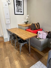Kitchen table with 3 chairs, different table and chairs than the listing