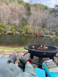 Relaxing fire pit at the waters edge.