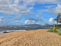 Beach, but walk south down bike path for swim cove.