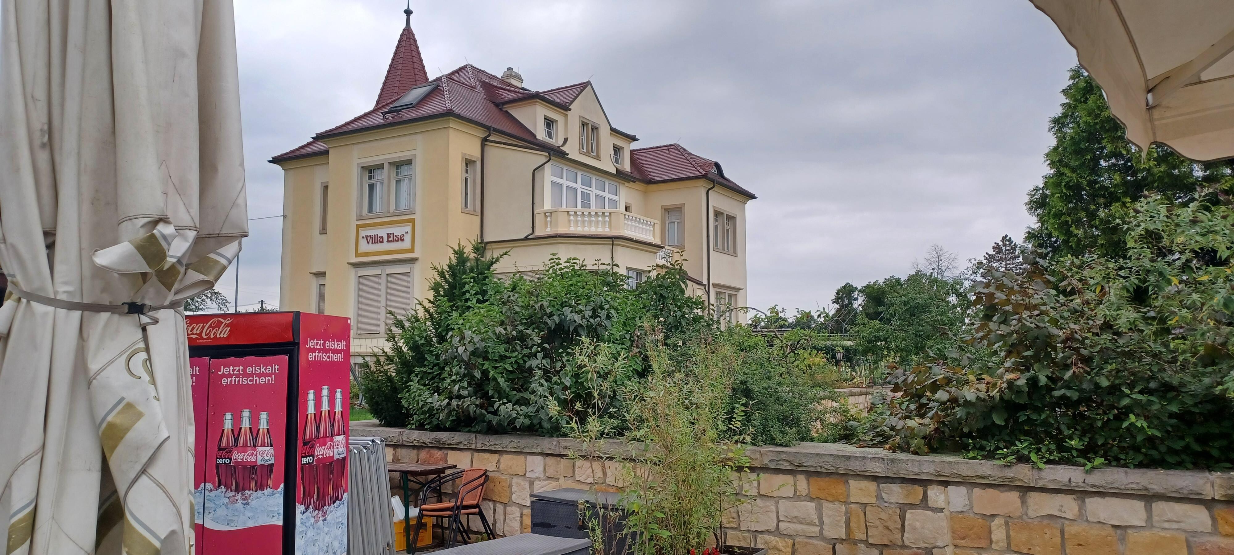 View of hotel from restaurant terrace.