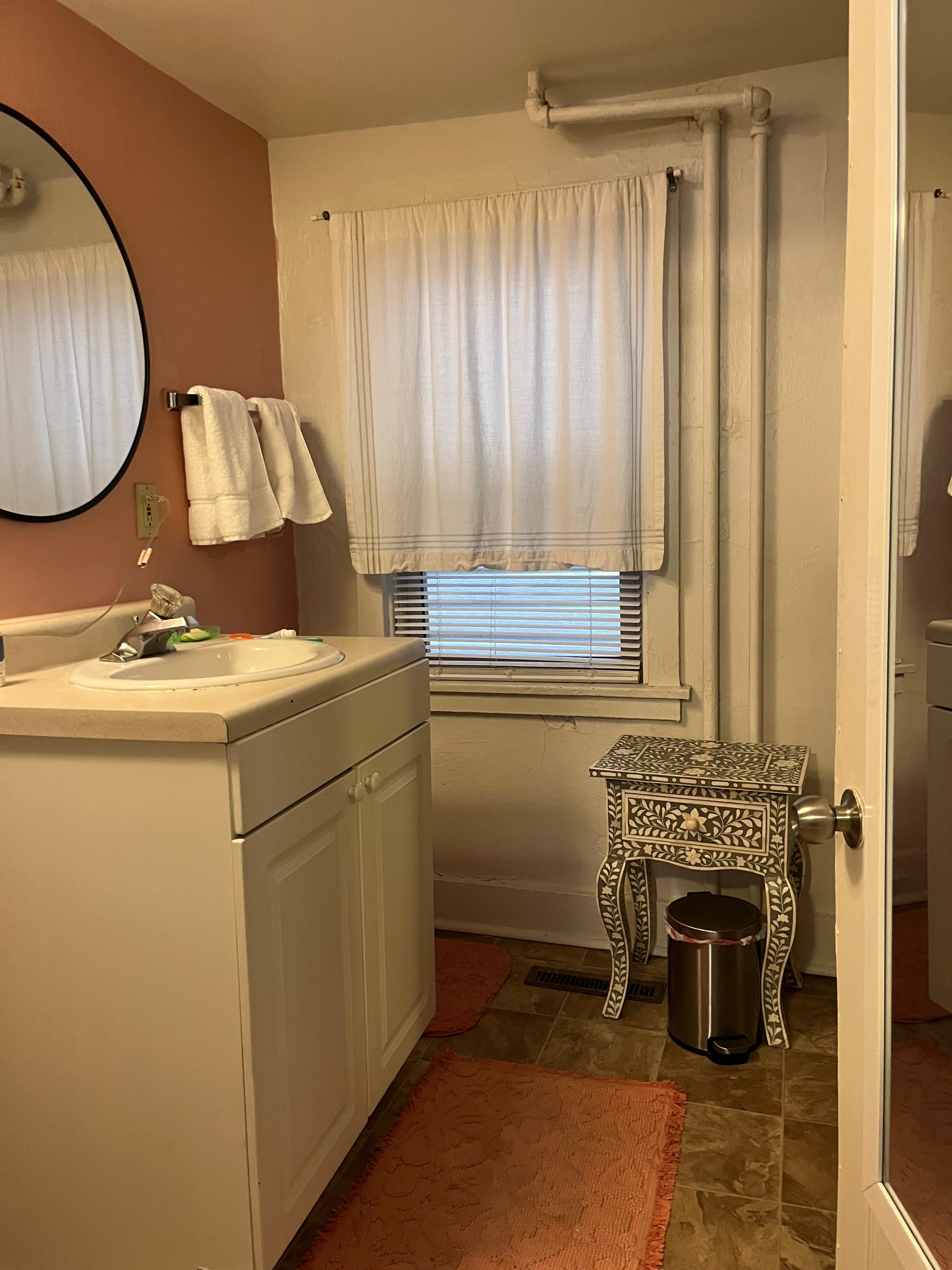 Clean and well stocked bathroom