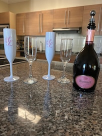 Welcome to Villa #4. Granite countertops in the kitchen are perfect for meal preparation and easy clean up.