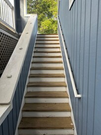 Sketchy stairs leading down to rooms. No other way to get bags to room unless you drag them down hill over the grass.