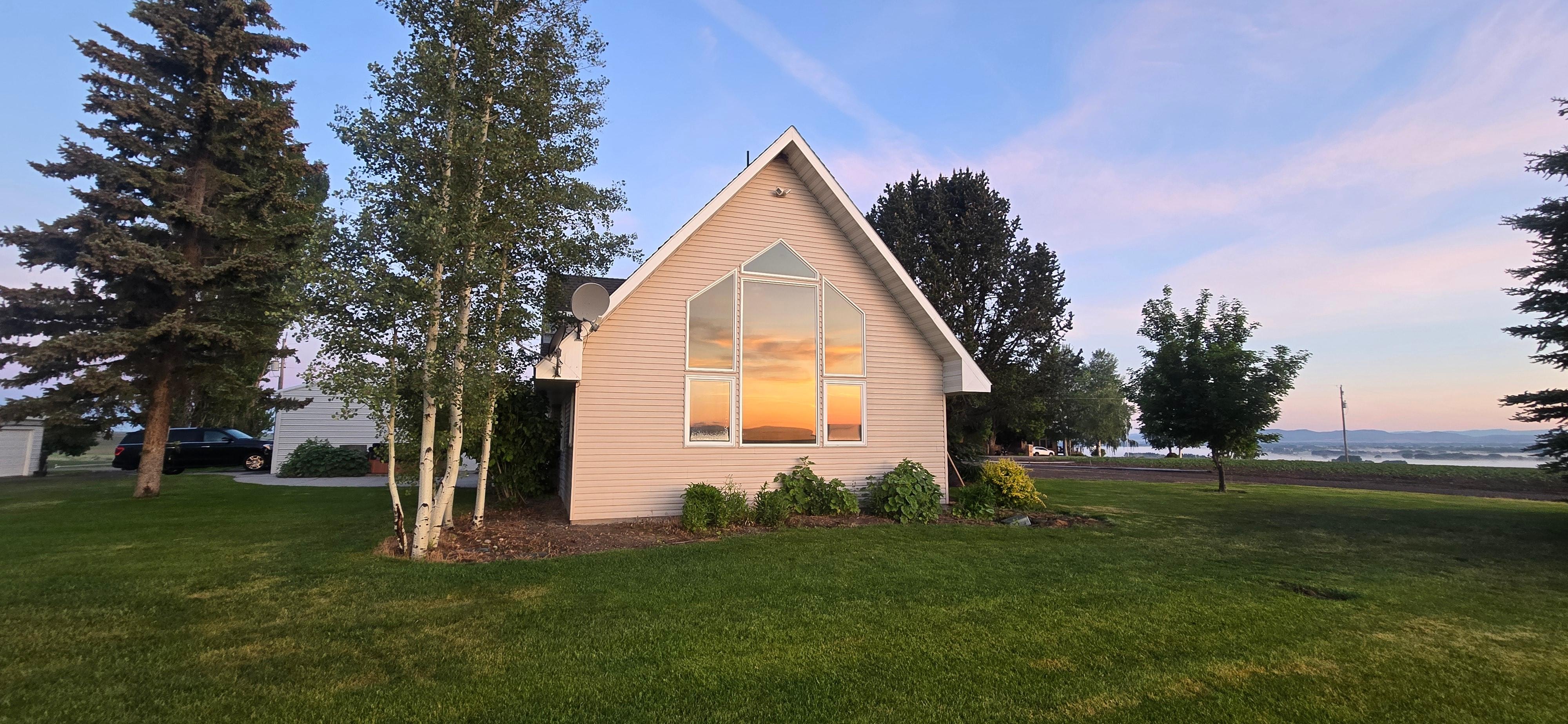 Sunrise reflection off kitchen window 