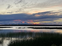 Sunrise over the water.