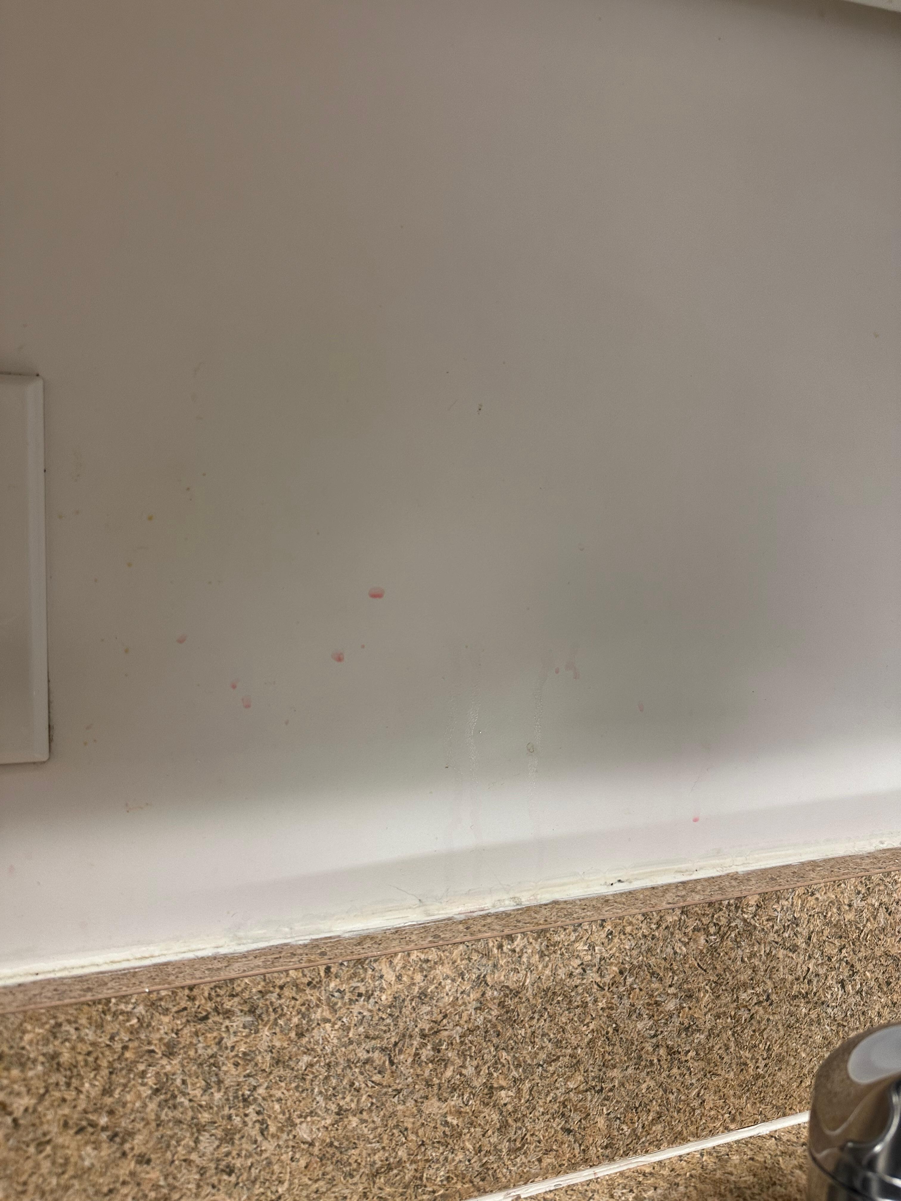 Stickiness that could easily be wiped. 