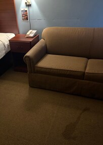 Huge stain on floor and huge scrape on the wall