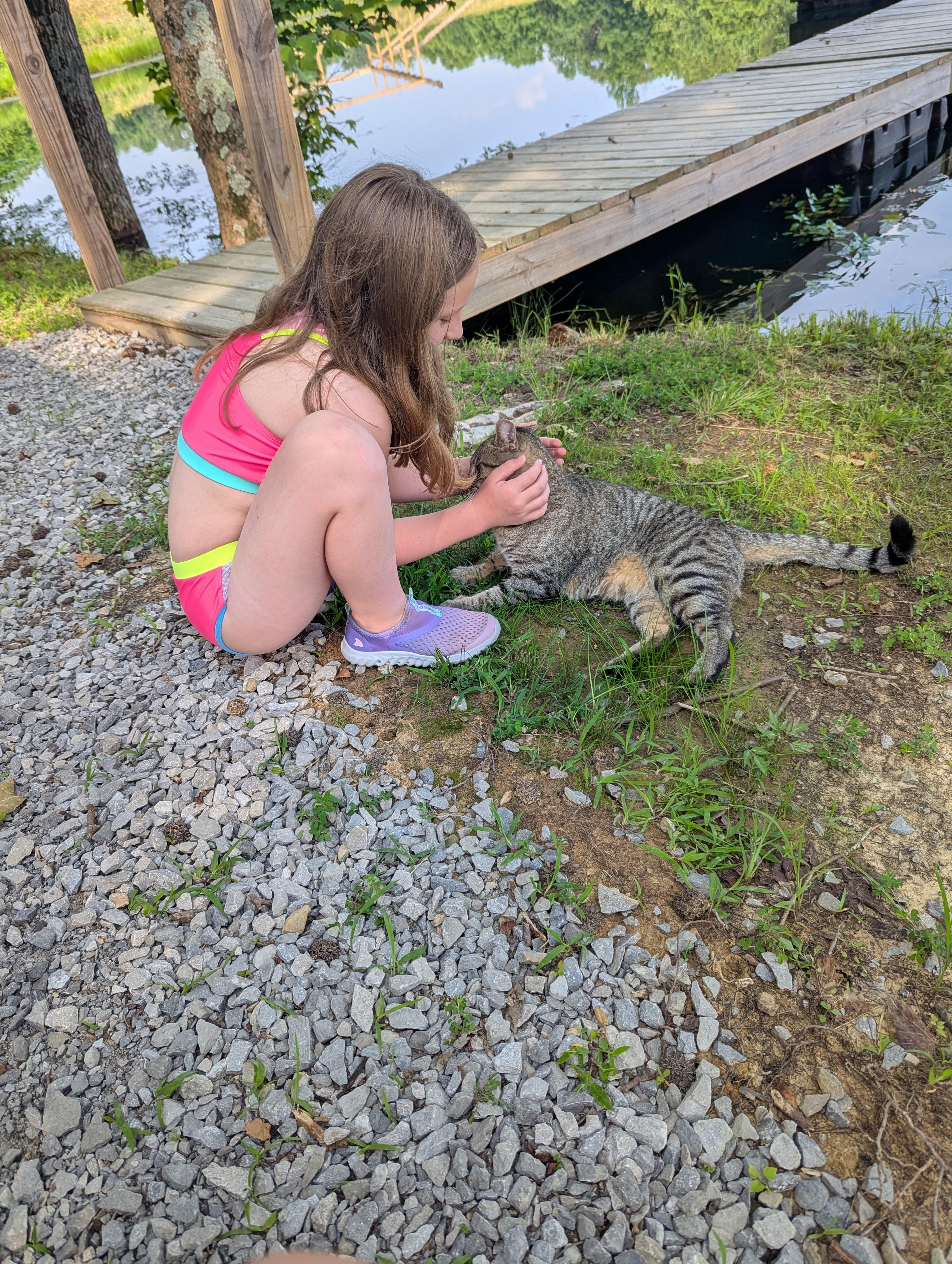 My daughter Amelia loving on the sweet kitty cat