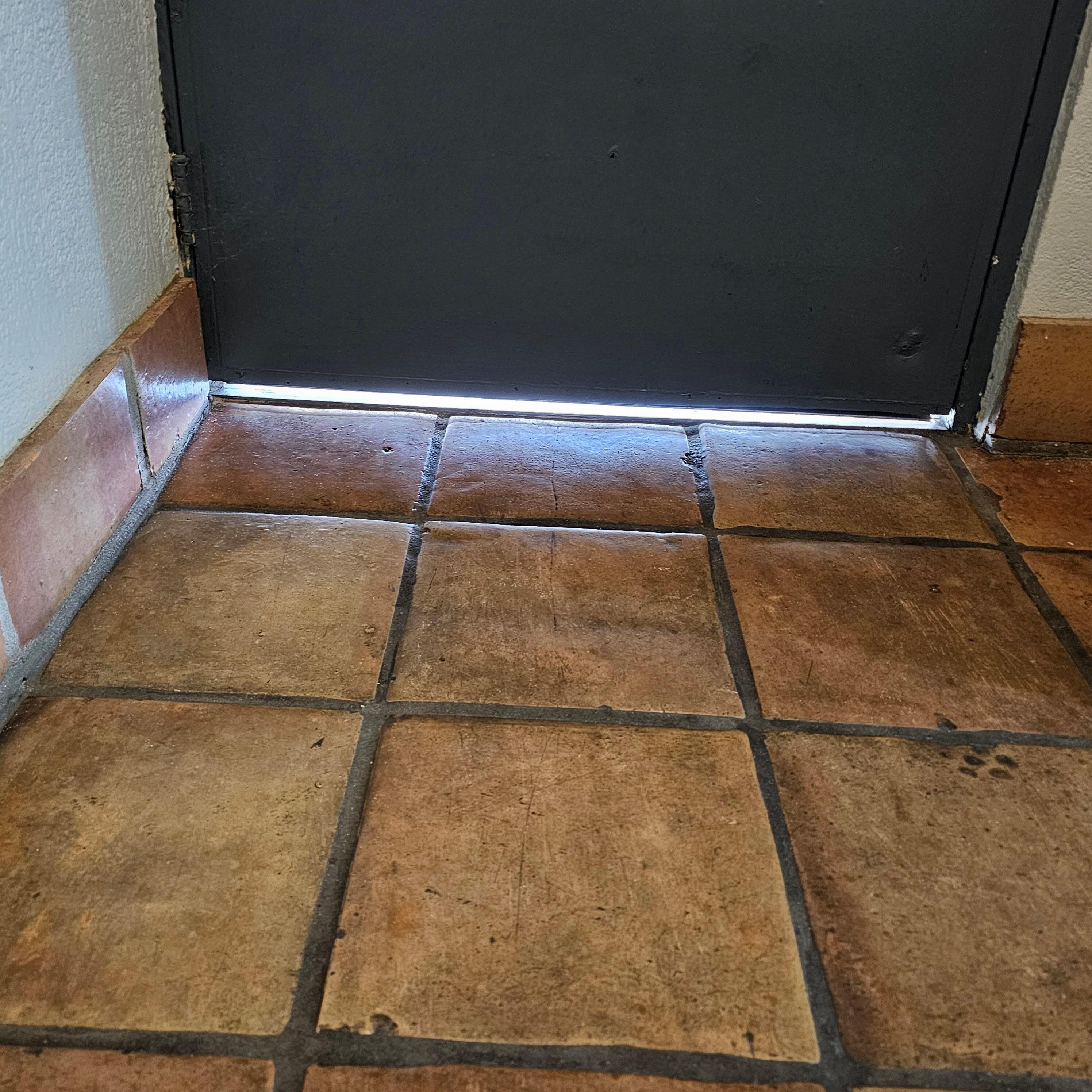 Huge gap under the door allowing bugs to continuously enter the room