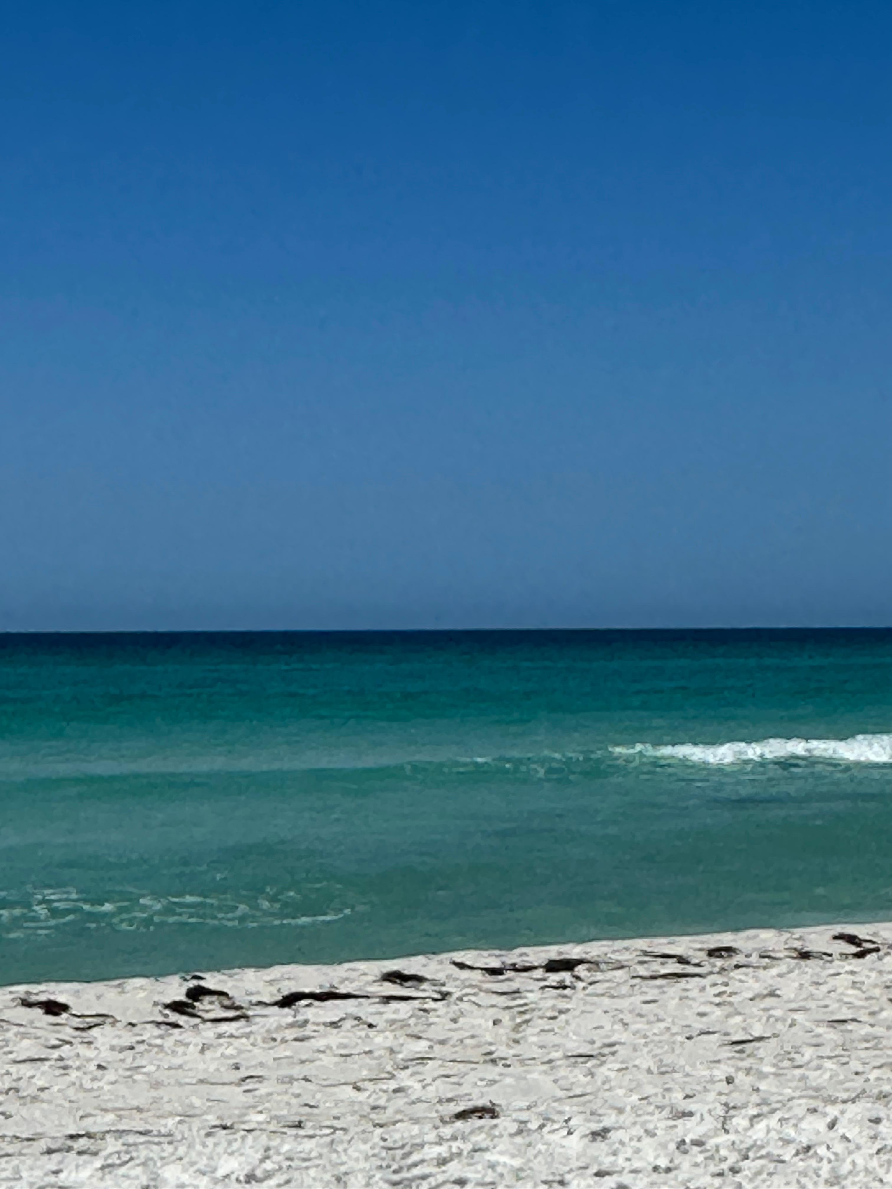 The beach outside the condo.