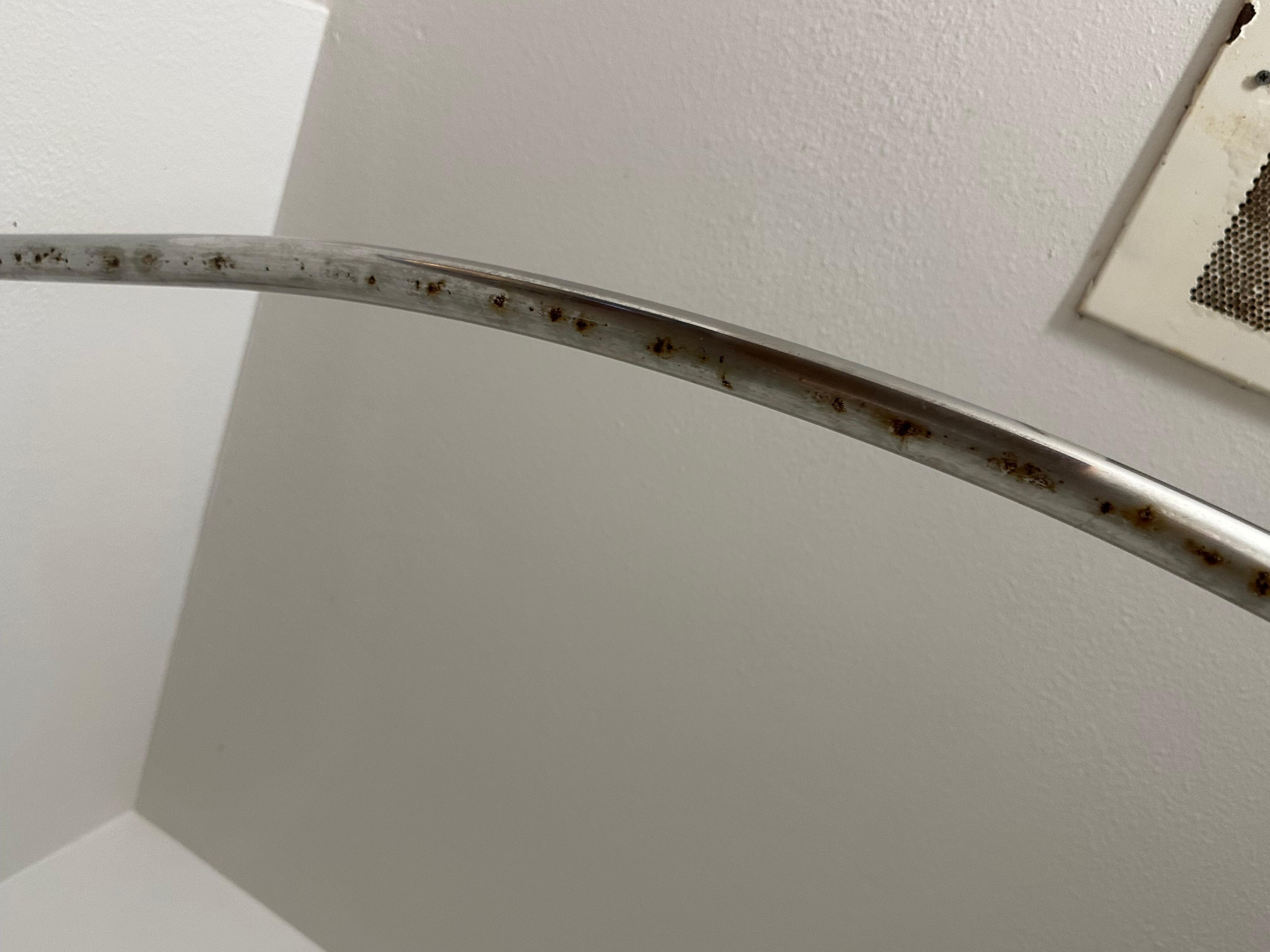 Rusted shower rod. 