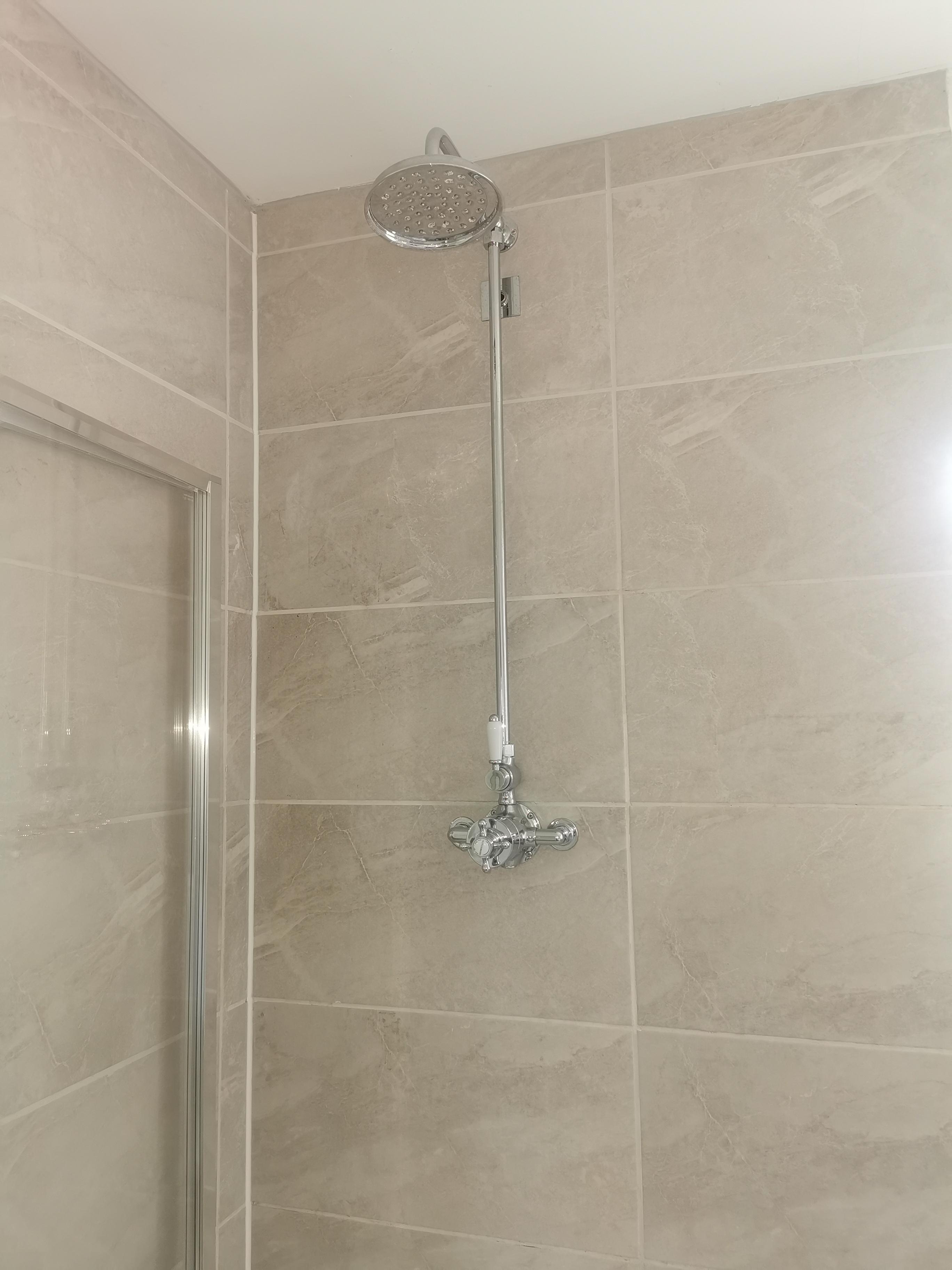 Bath with shower over the top