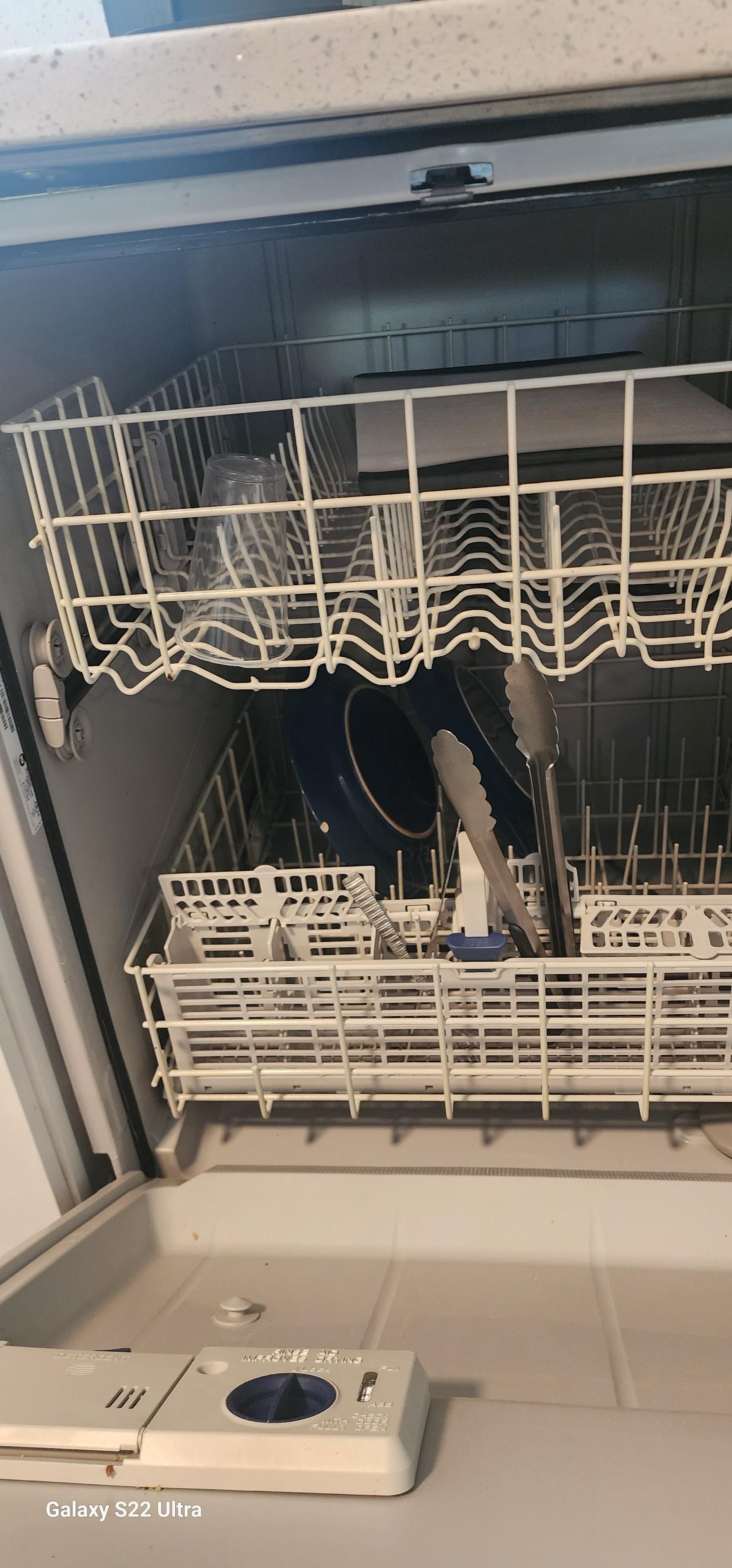 Dirty dishes in the dishwasher.