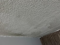 Water damage repaired but not painted with any care