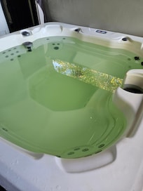 Green water in hot tub.