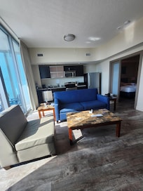 The living room and kitchen