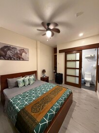 Clean, cool, and spacious room.