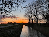 Sunset in front of the house.