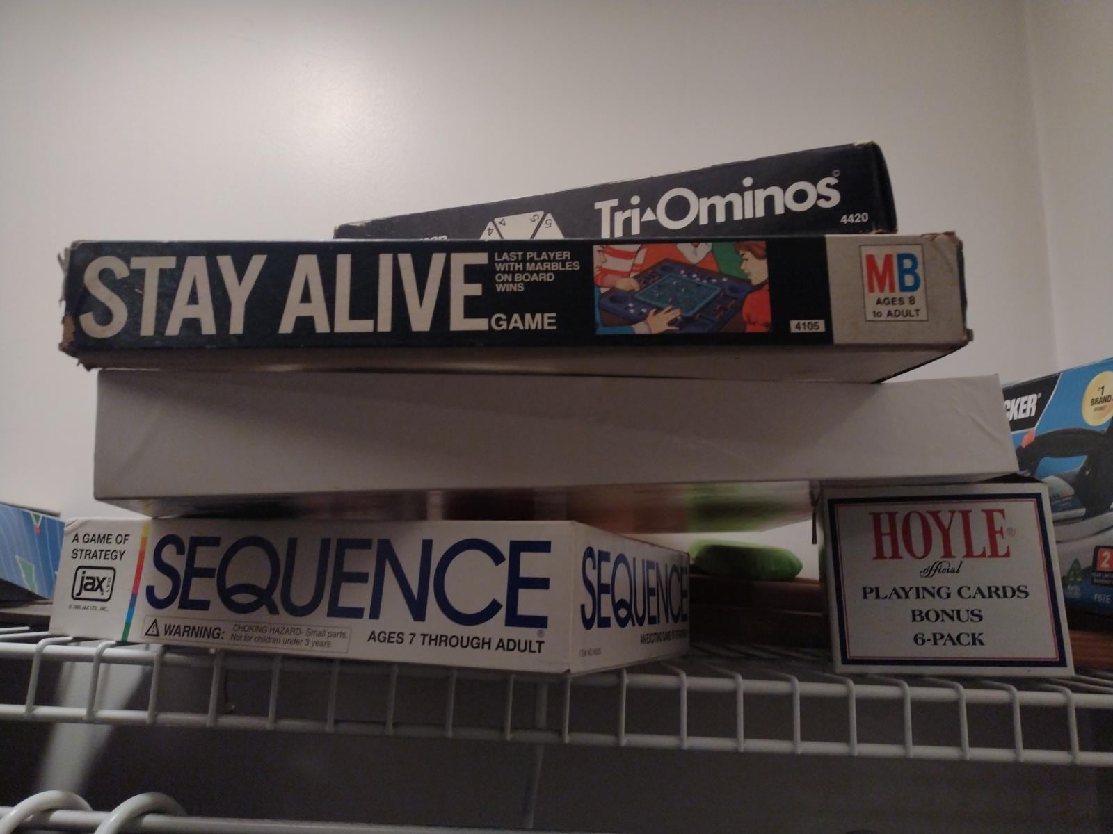 Game closet with both indoor and outdoor games. The home is also filled with a large supply of books for those that just want to relax and read.