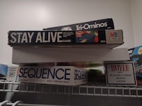 Game closet with both indoor and outdoor games. The home is also filled with a large supply of books for those that just want to relax and read.