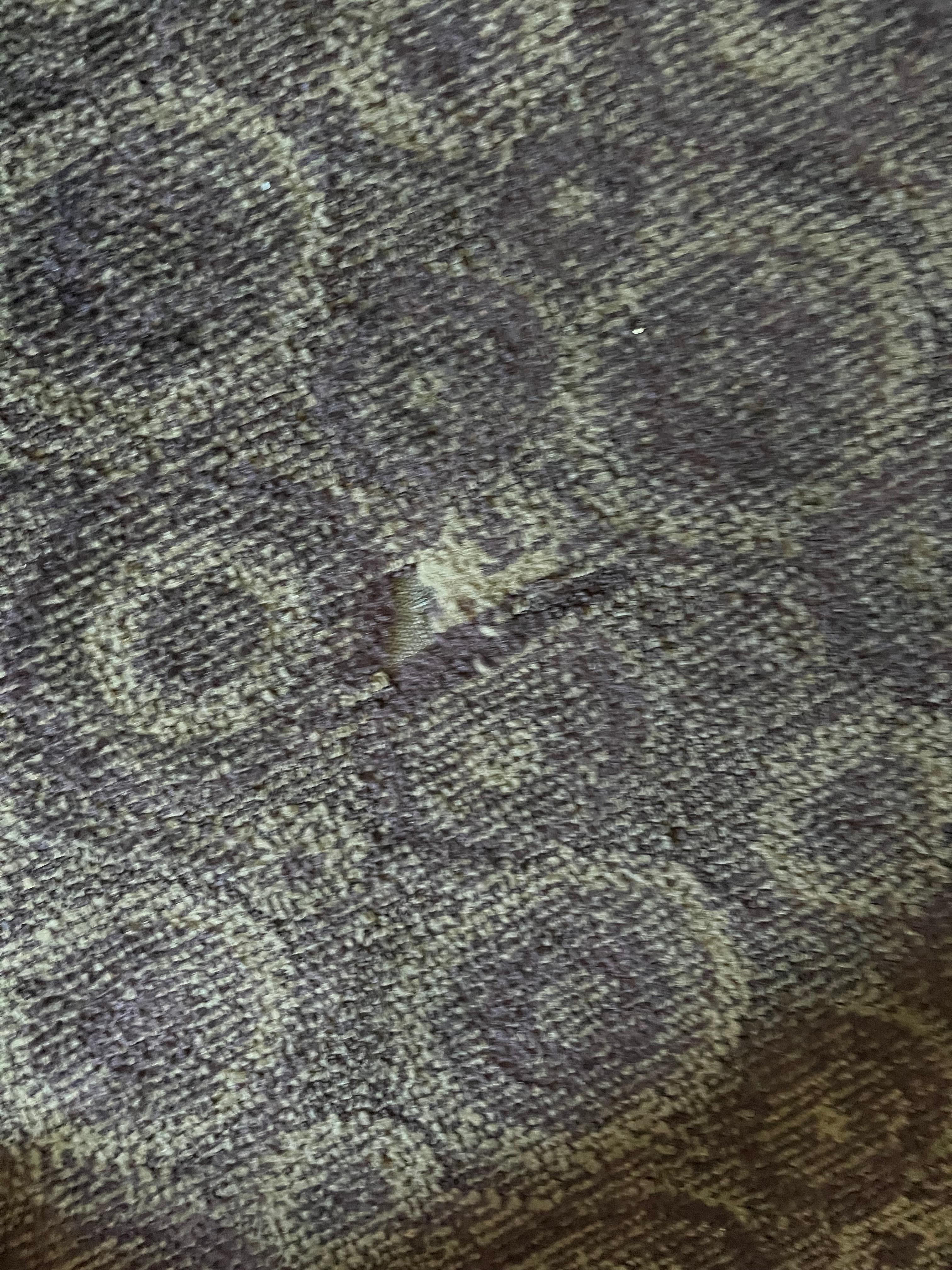 Torn carpet . Trip hazard