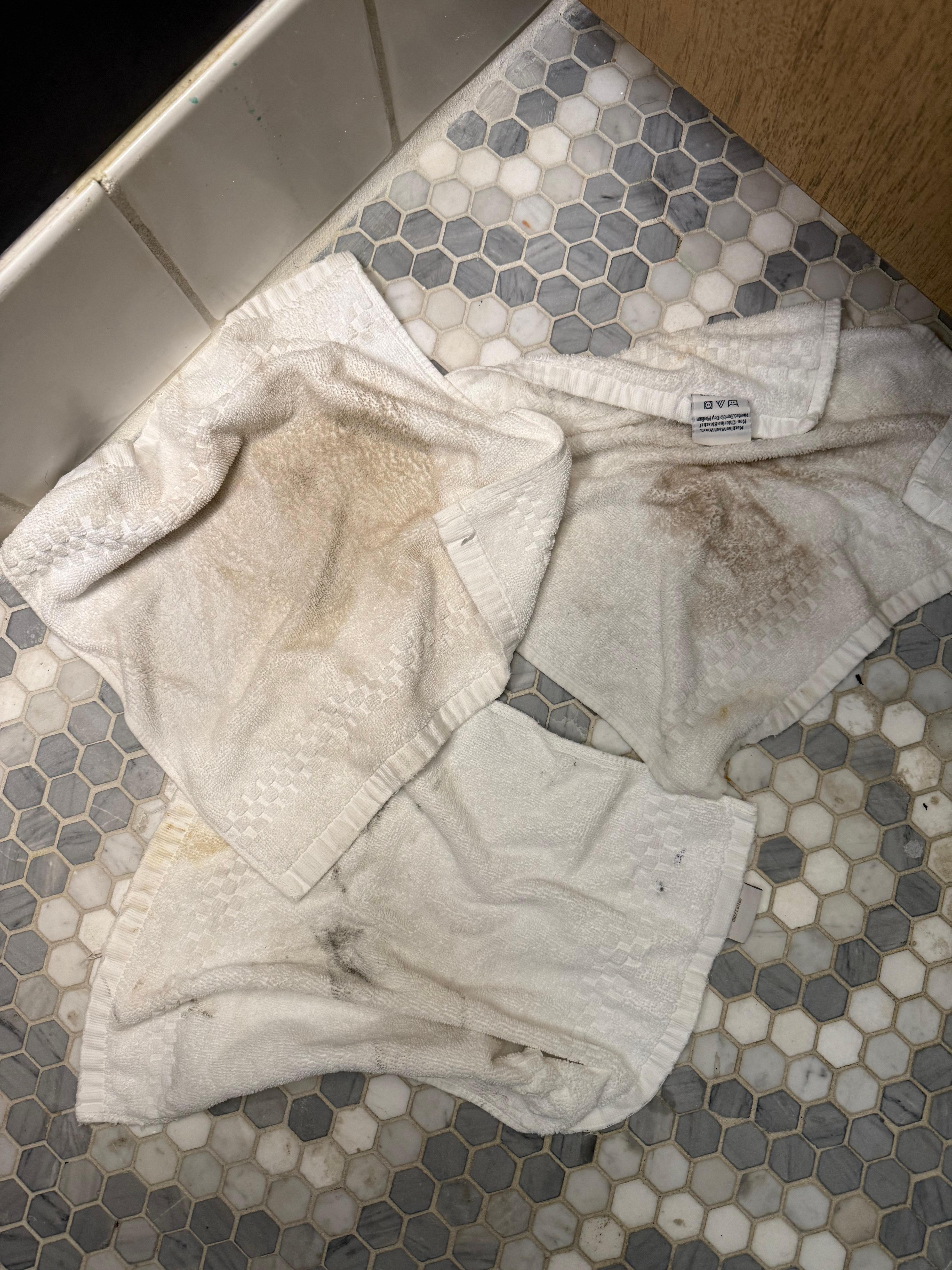 Dirt from headboard, nightstands table and light switches 