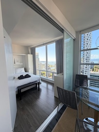 View to bedroom and dining area. Sliding glass doors divide the areas if wanted.