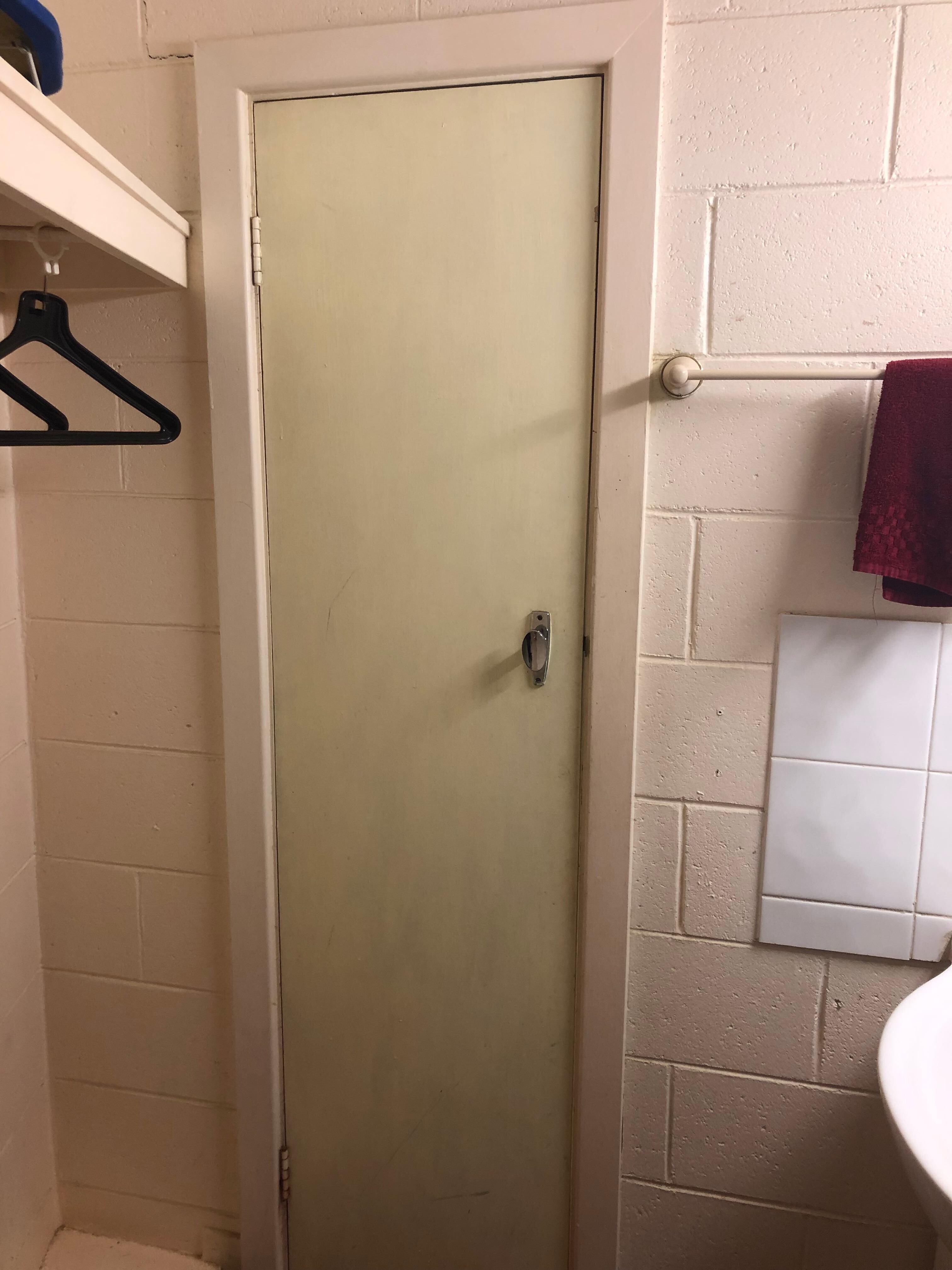 Tiny little door to access bathroom and toilet