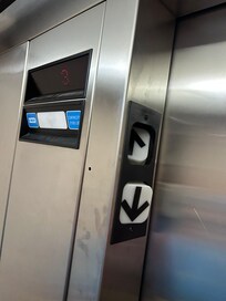 Elevator with broken elevator lights