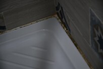 Both showers were moldy